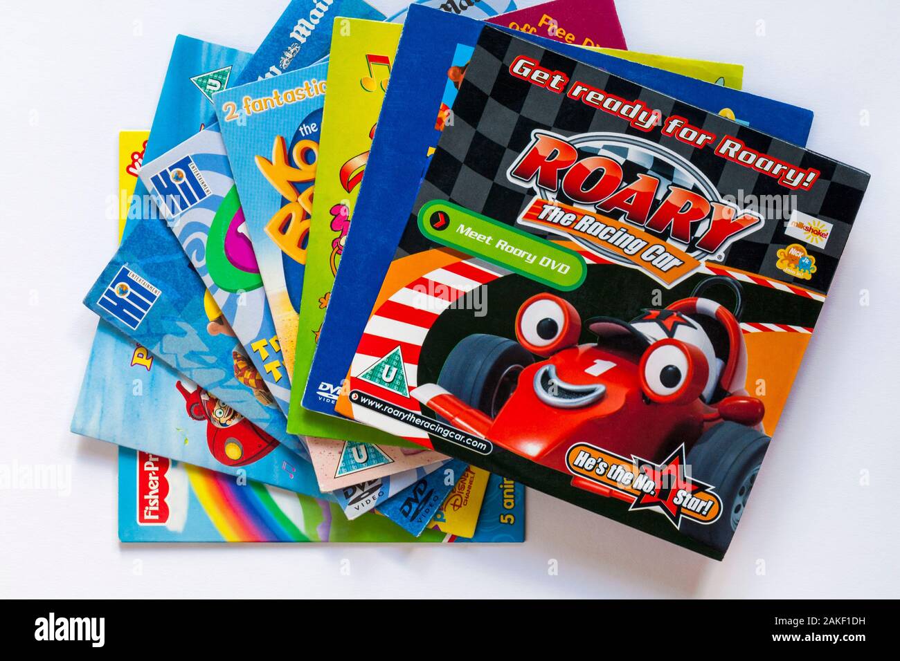 Selezione dei bambini del dvd con Roary la vettura da corsa sulla parte superiore impostato su sfondo bianco Foto Stock