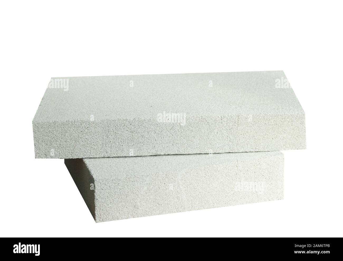 Struttura leggera in mattoni isolata su bianco. Blocco leggero in gesso espanso isolato su bianco Foto Stock