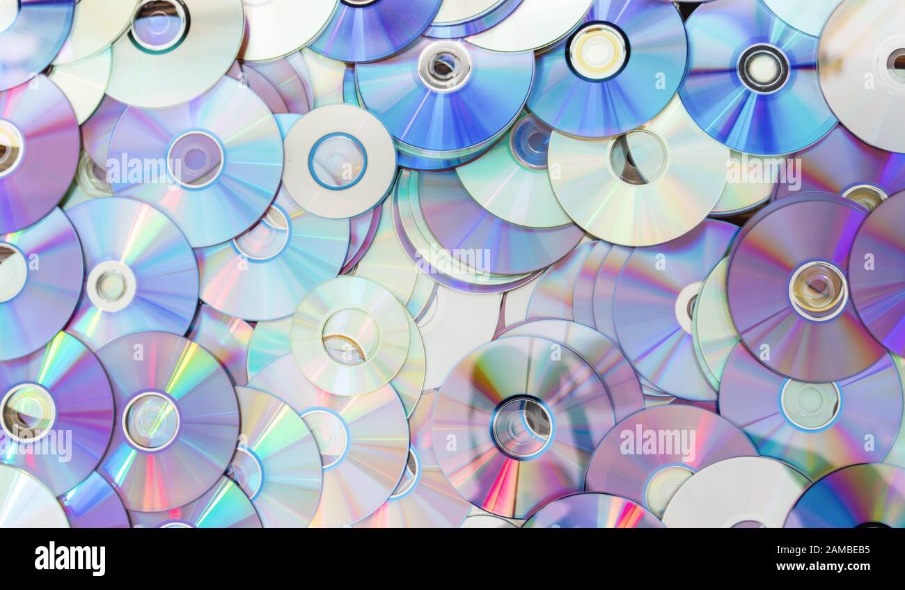 Vecchia tecnologia, rifiuti compact disc raccolta decorazione per modello. CD background concetto Foto Stock