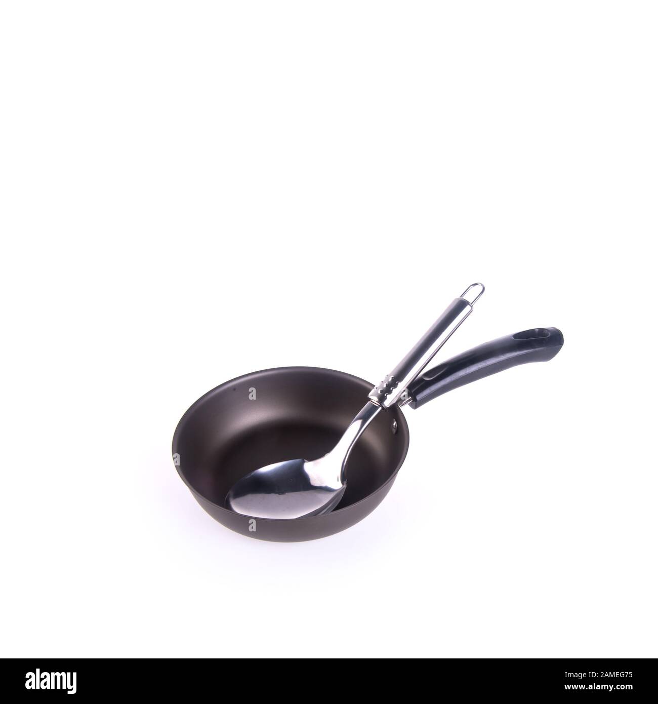 padella o padella in metallo su uno sfondo nuovo Foto Stock