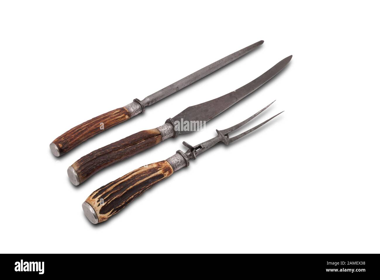 Set di tavoli da caccia (da coltello, forchetta e lima se mangiare molto :) Gran Bretagna. 19th secolo. Percorso su sfondo bianco. Foto Stock