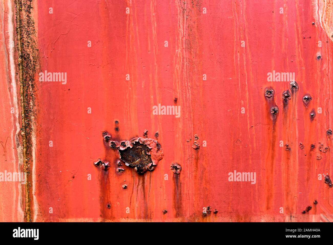 Rosso Metallo arrugginito texture fondo ruggine acciaio con vernice arancione rosso. Struttura metallica industriale. Grunge trama in metallo arrugginito, ruggine di fondo. Foto Stock
