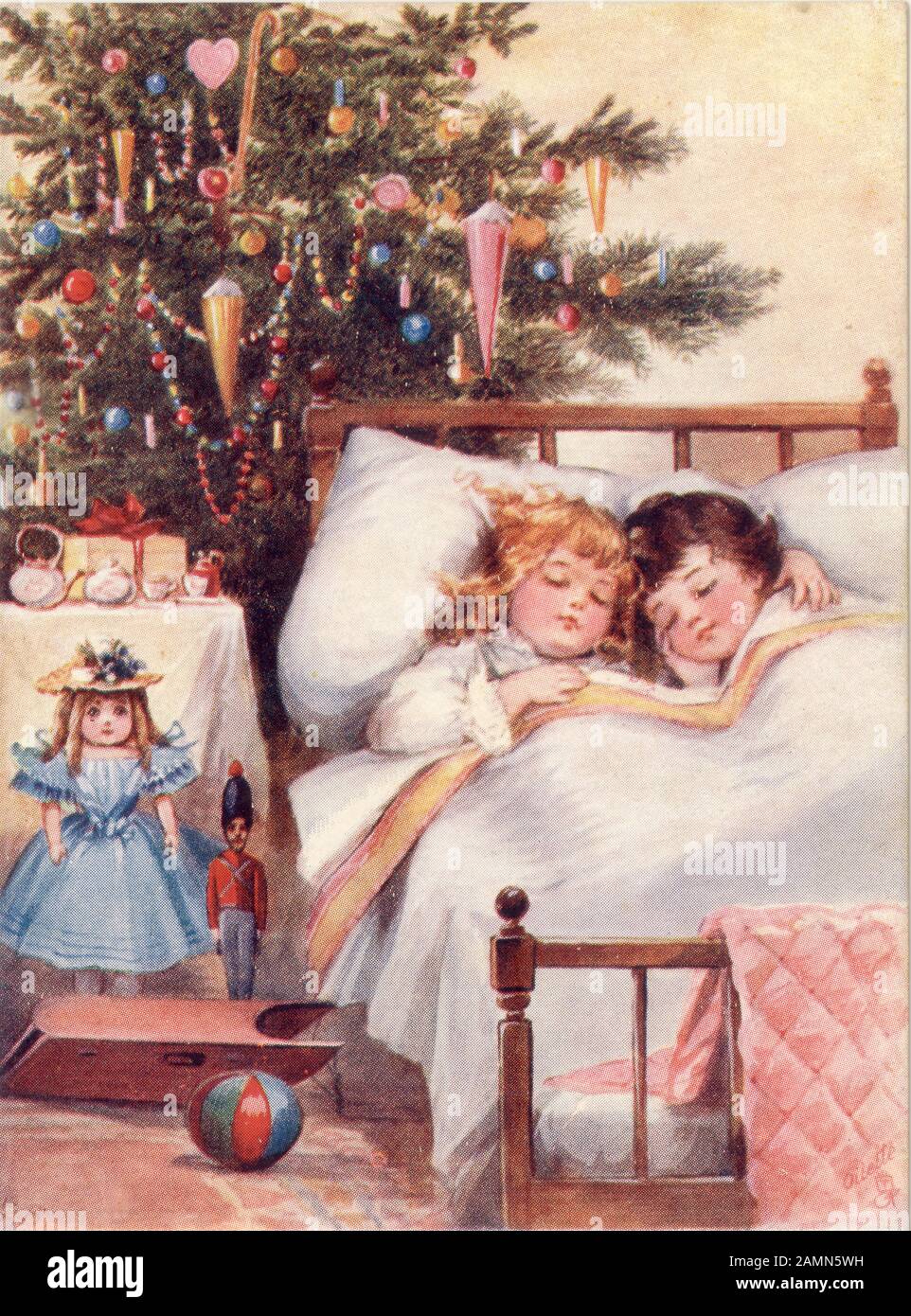 Cartolina di auguri di Natale originale e carina tradizionale dei bambini, nascosta nel letto la mattina di Natale con regali e alberi, olietta originale, risalente al 1900 circa in Inghilterra, Regno Unito Foto Stock