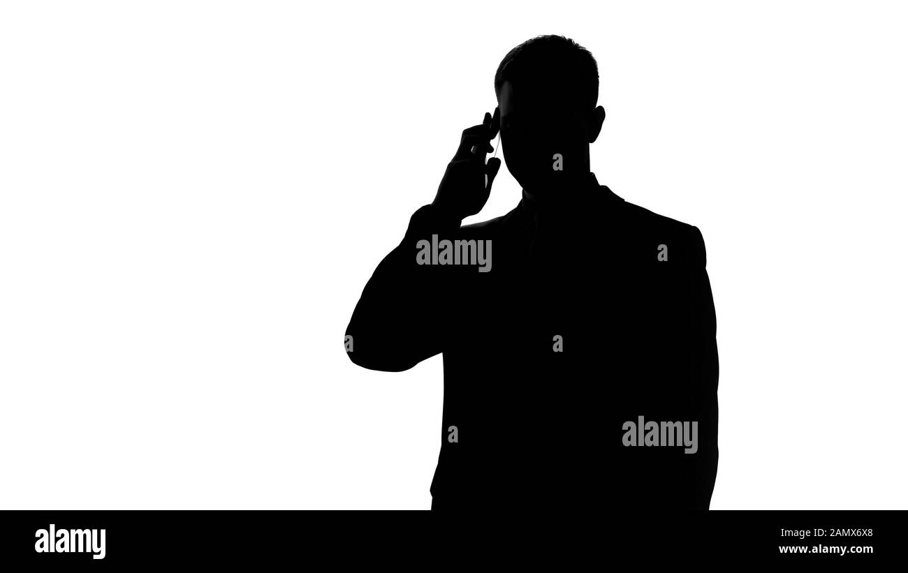 Uomo d'affari che parla su cellulare, discussione di idea con il partner, startup Foto Stock