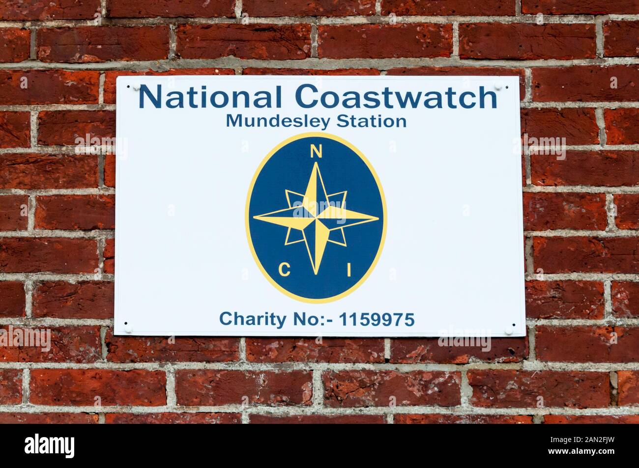 Un segno per la stazione di Mundesley del Coastwatch nazionale. Foto Stock