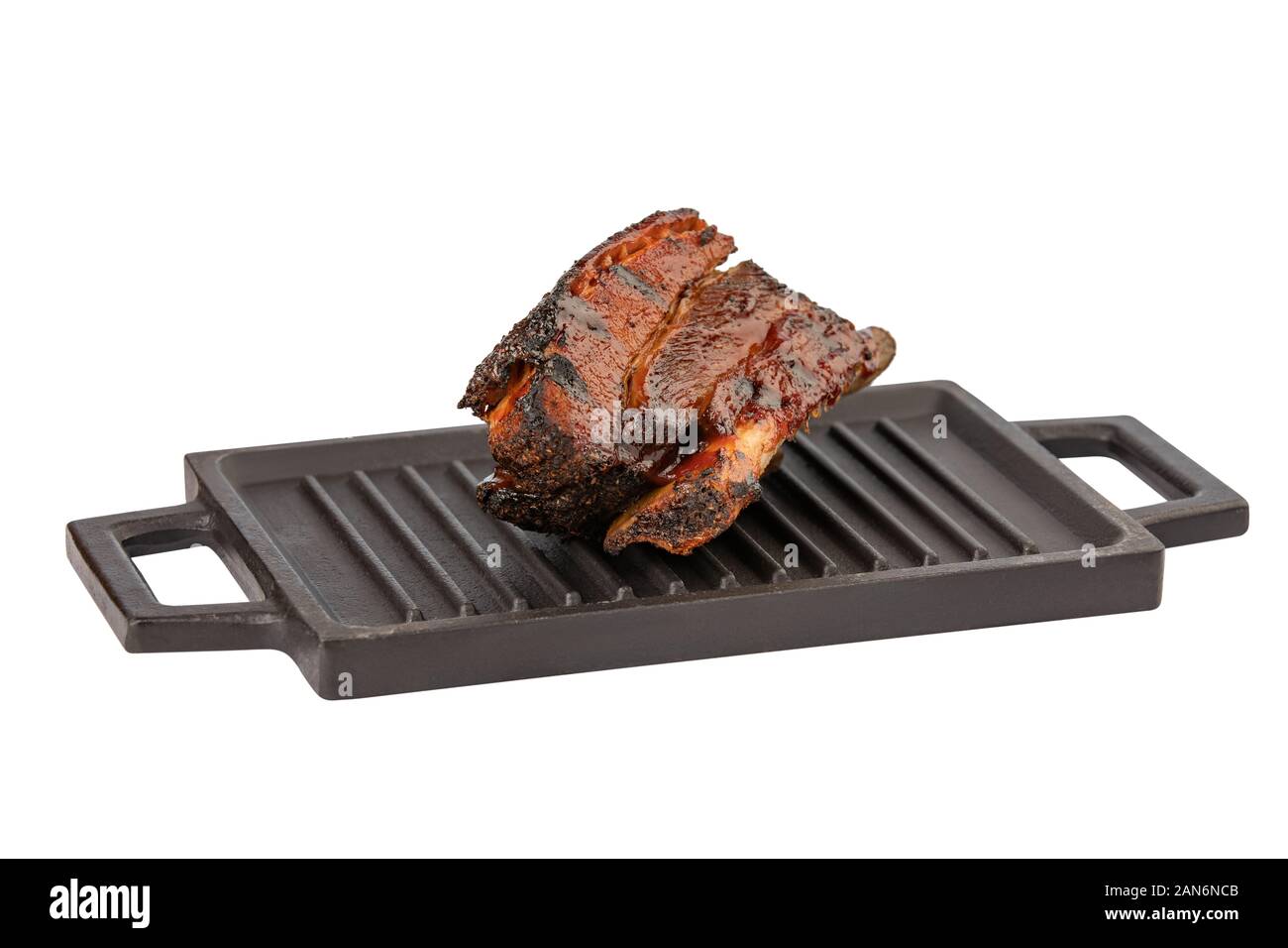 Carne e salsa al buio su un bordo di pietra Foto Stock