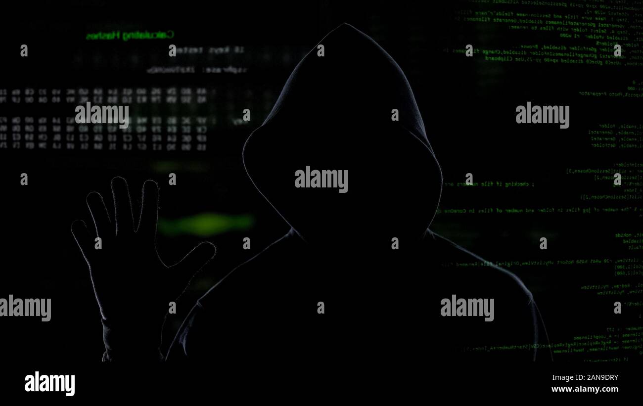 Anonimo hacker ruba segreto informazioni aziendali, dati di attacco del sistema Foto Stock