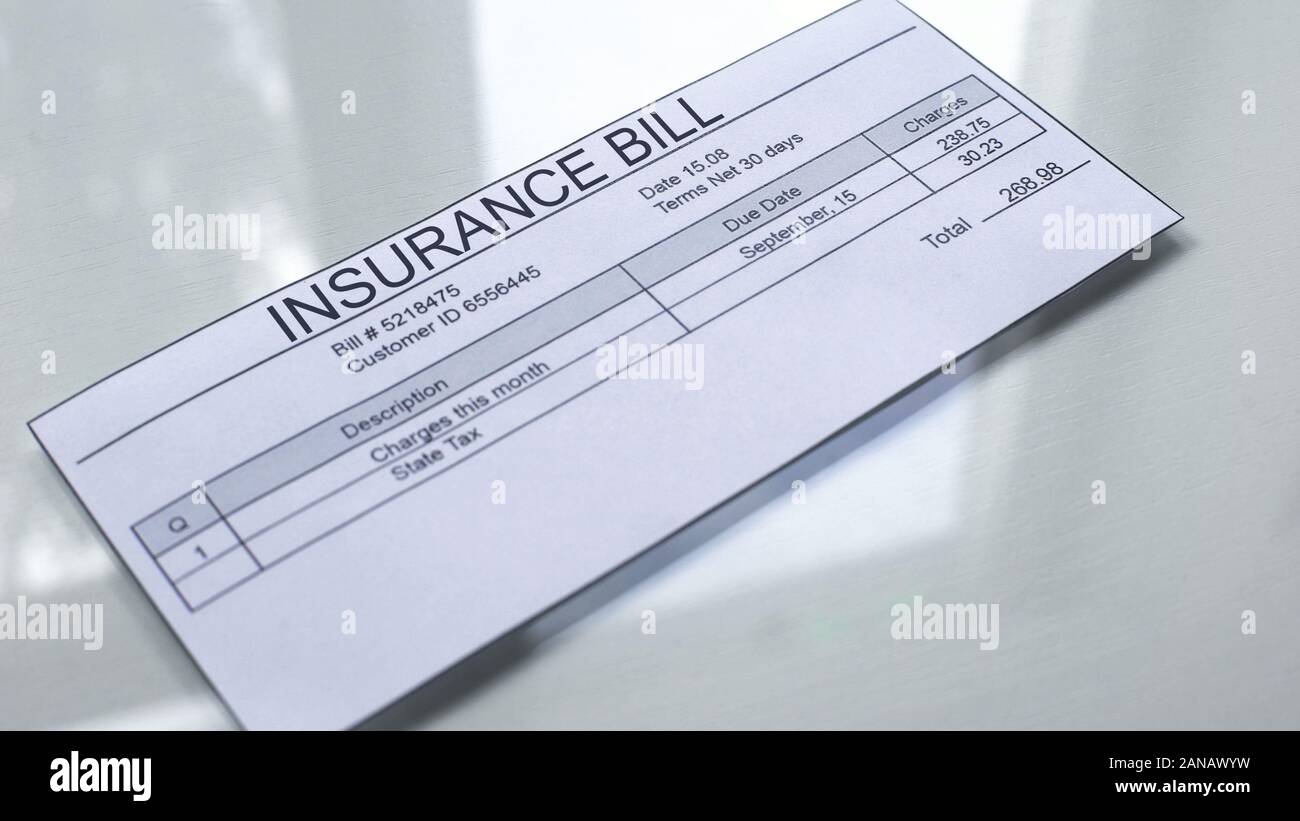 Disegno di legge di assicurazione giacente sul tavolo, i pagamenti per i servizi e la politica di protezione tariffaria, Foto Stock