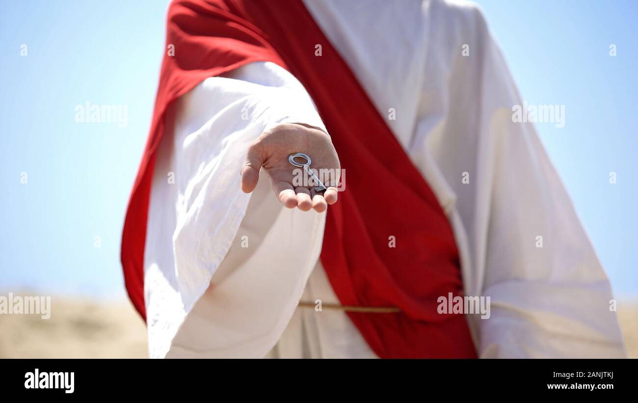 Gesù mano azienda chiave, divulgazione di cuore e nascosto e il pensiero di Dio, anima pura Foto Stock