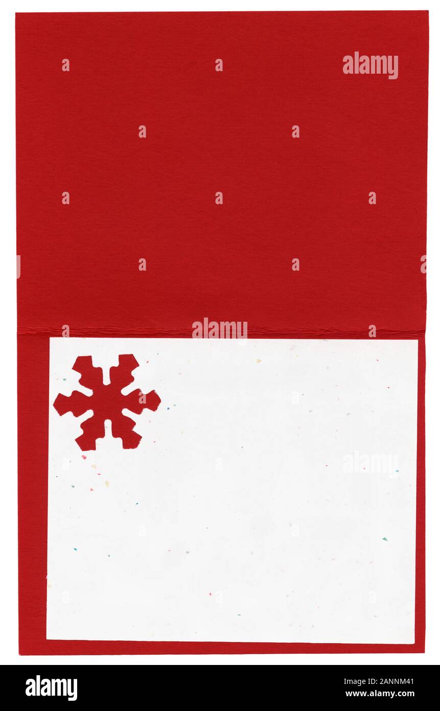 Blank scheda di Natale. Scansione ad alta risoluzione mostra tutti i dettagli.. Rosso e bianco carta pesante il cartoncino è lo sfondo con un fiocco di neve tagliati fuori. Foto Stock