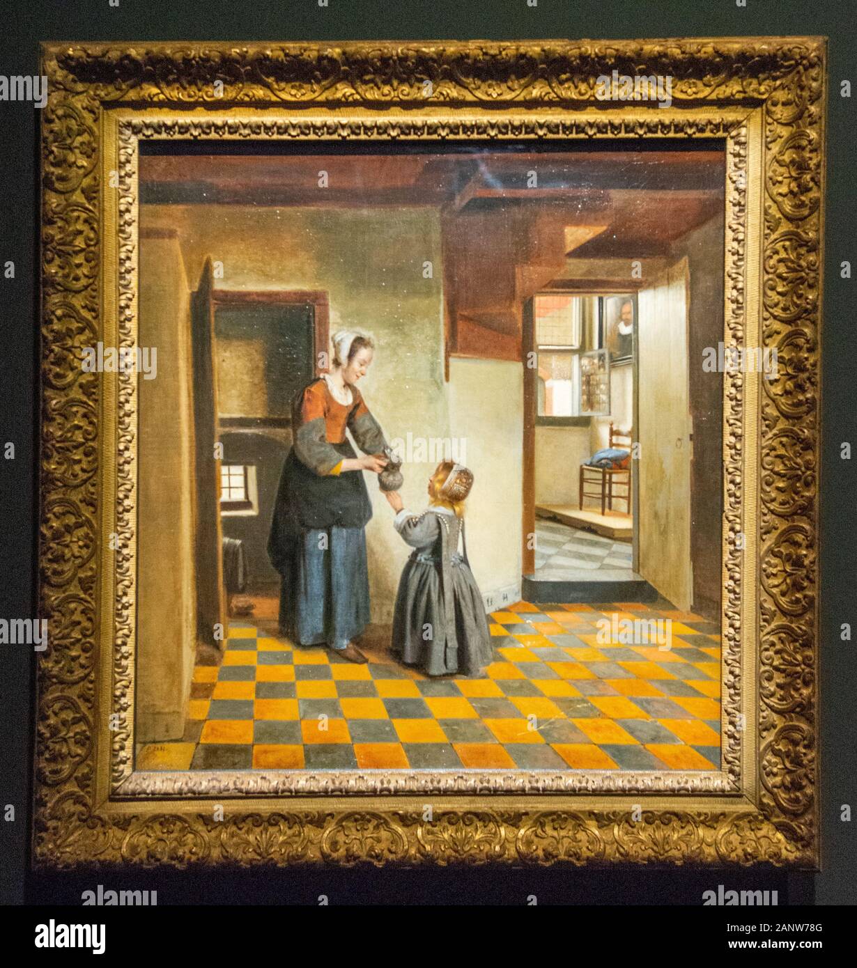 "Una donna con un bambino in una dispensa' di Pieter De Hooch, pittore olandese del XVII secolo Foto Stock