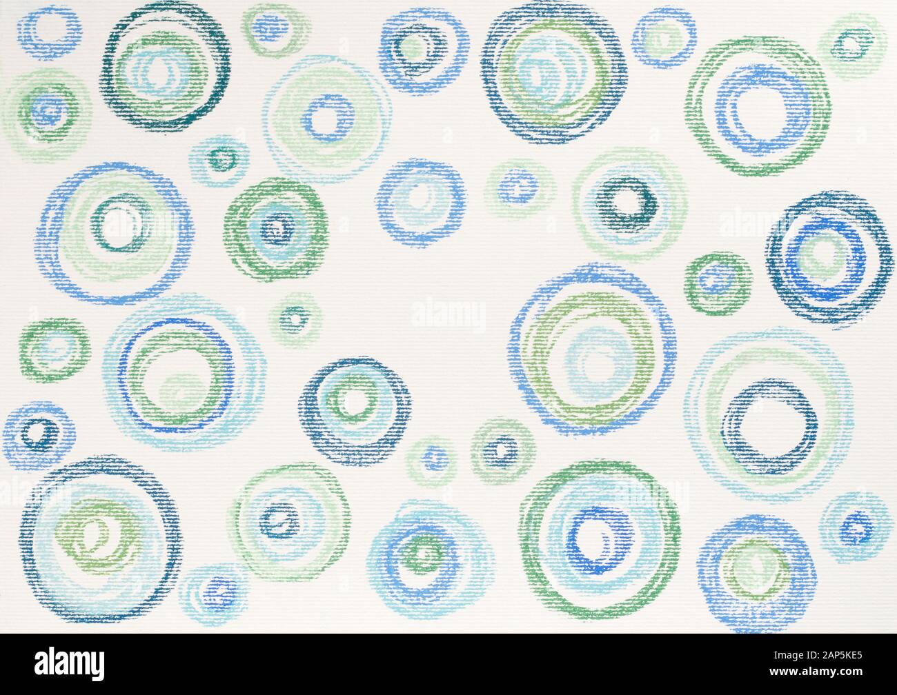 Disegno pastello di cerchi blu e verdi su carta texture Foto Stock