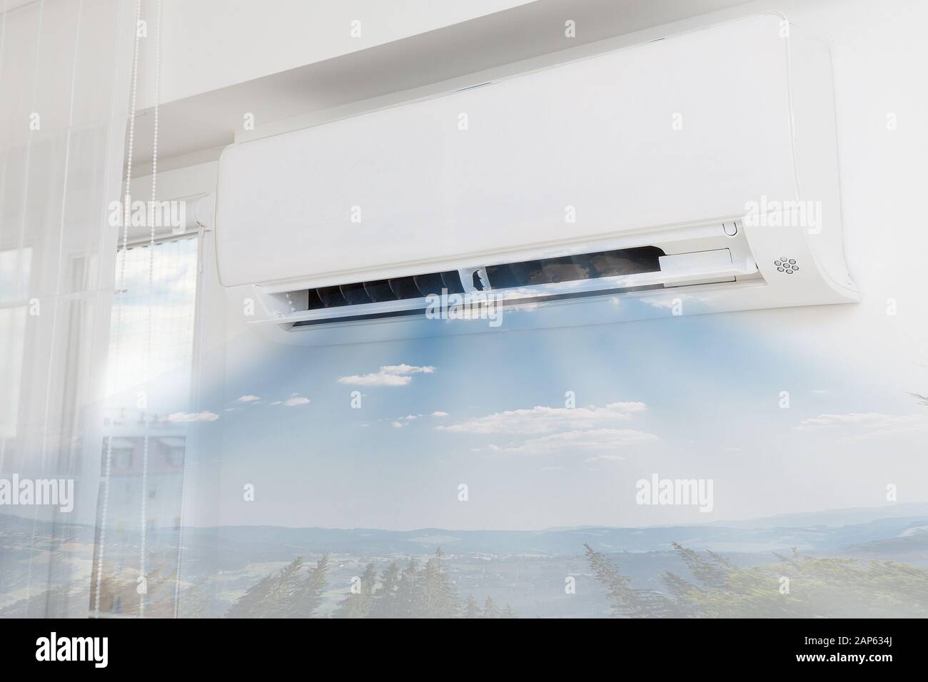 Il condizionatore d'aria di soffiaggio aria fredda. Home concetti interni. Foto Stock
