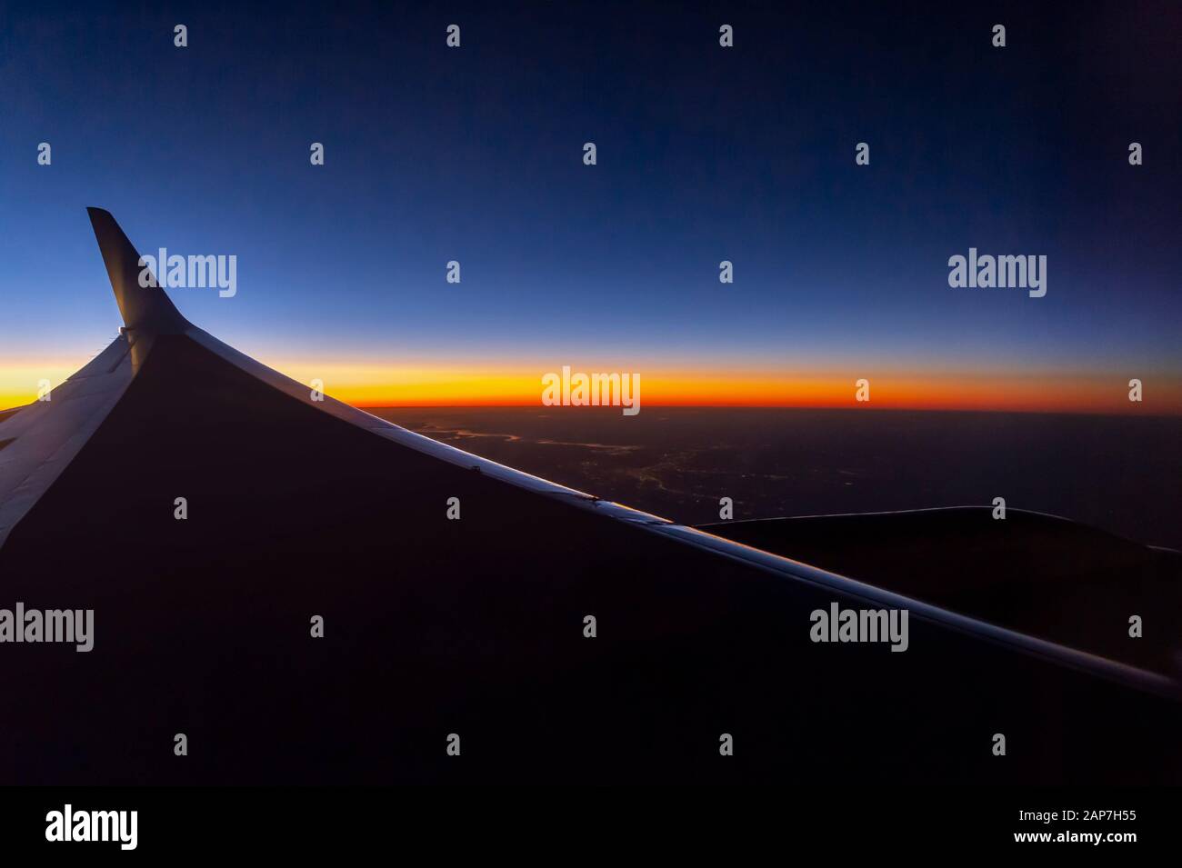 Ala di aeroplano di sunrise Foto Stock