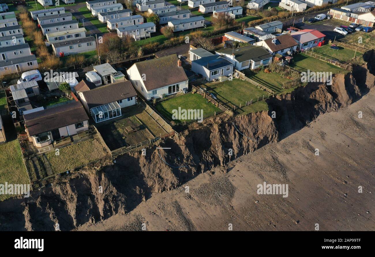 Case sulla costa di Skipsea, East Ridings of Yorkshire, dove i consiglieri sono impostati per discutere l'effetto 'evastating' di erosione che vedrà decine di persone a Skipsea perdere le loro case al mare sulla costa più rapida scomparsa in Nord Ovest Europa. Foto Stock