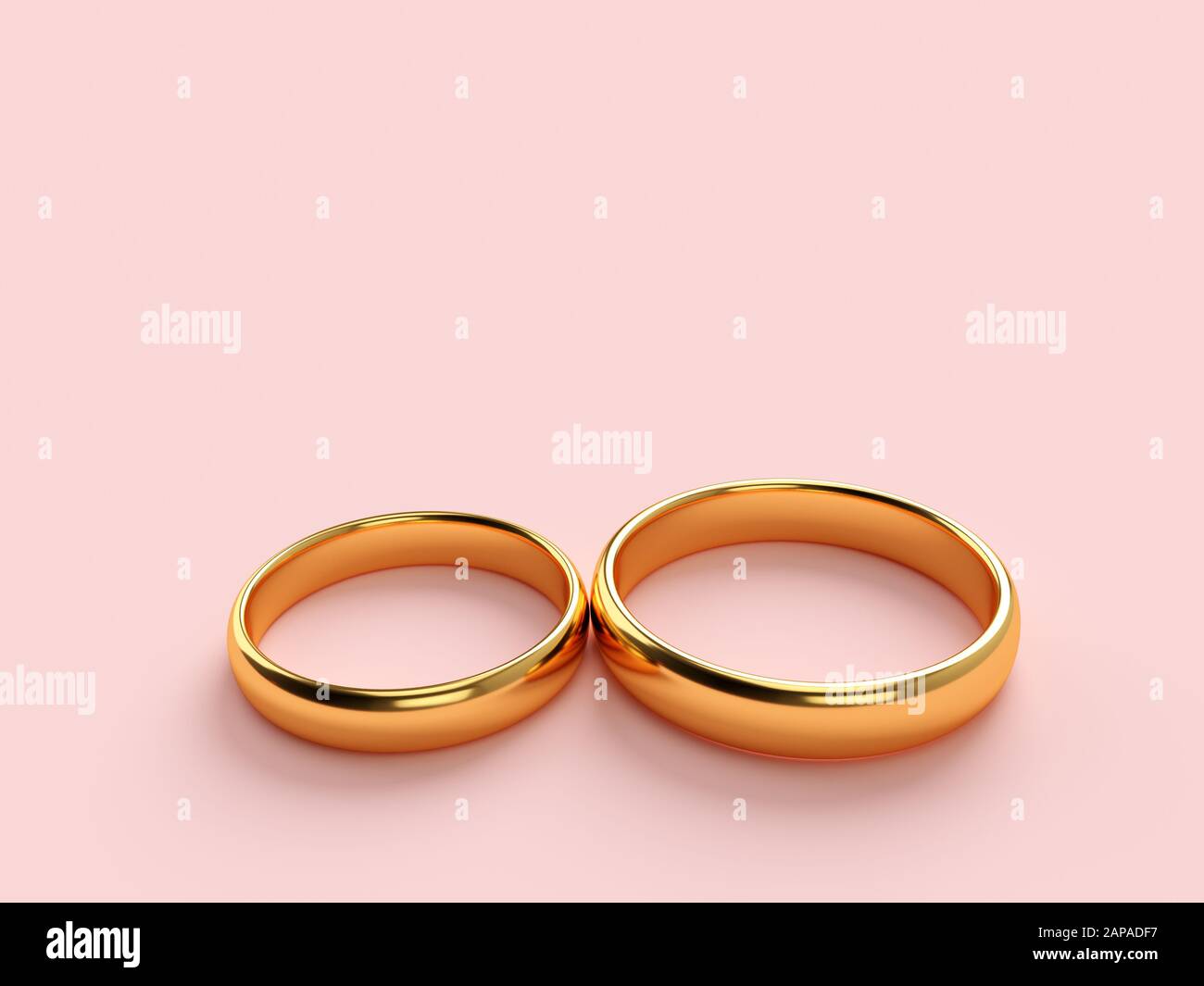 Matrimonio di due anelli in oro giacciono su ogni altro con uno spazio vuoto per il testo. Il rendering 3D Foto Stock