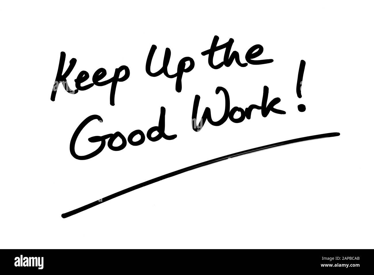 Continua Il Buon Lavoro! scritto a mano su sfondo bianco. Foto Stock