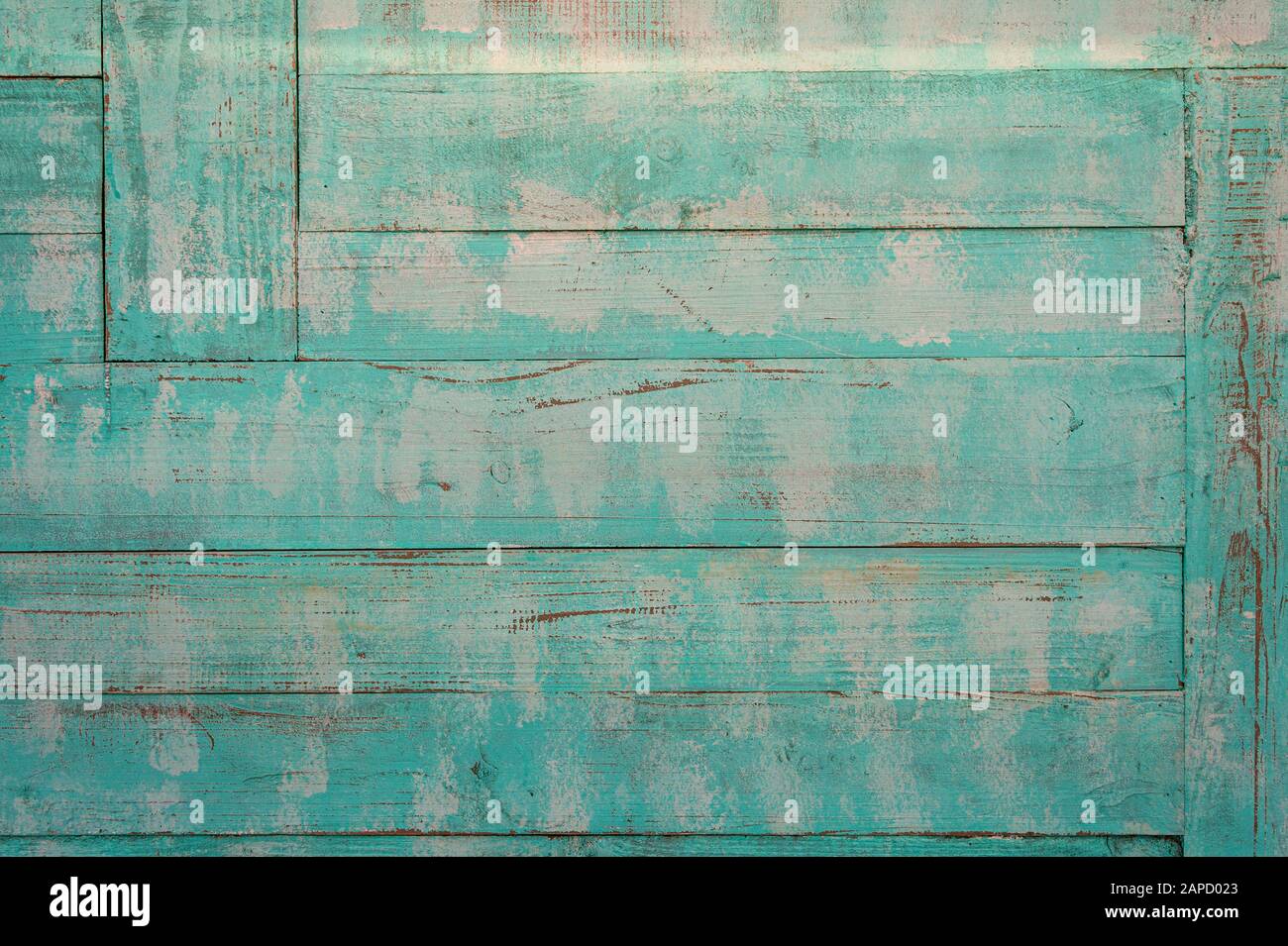 tavole di legno in difficoltà, vernice verde pastello. Foto Stock