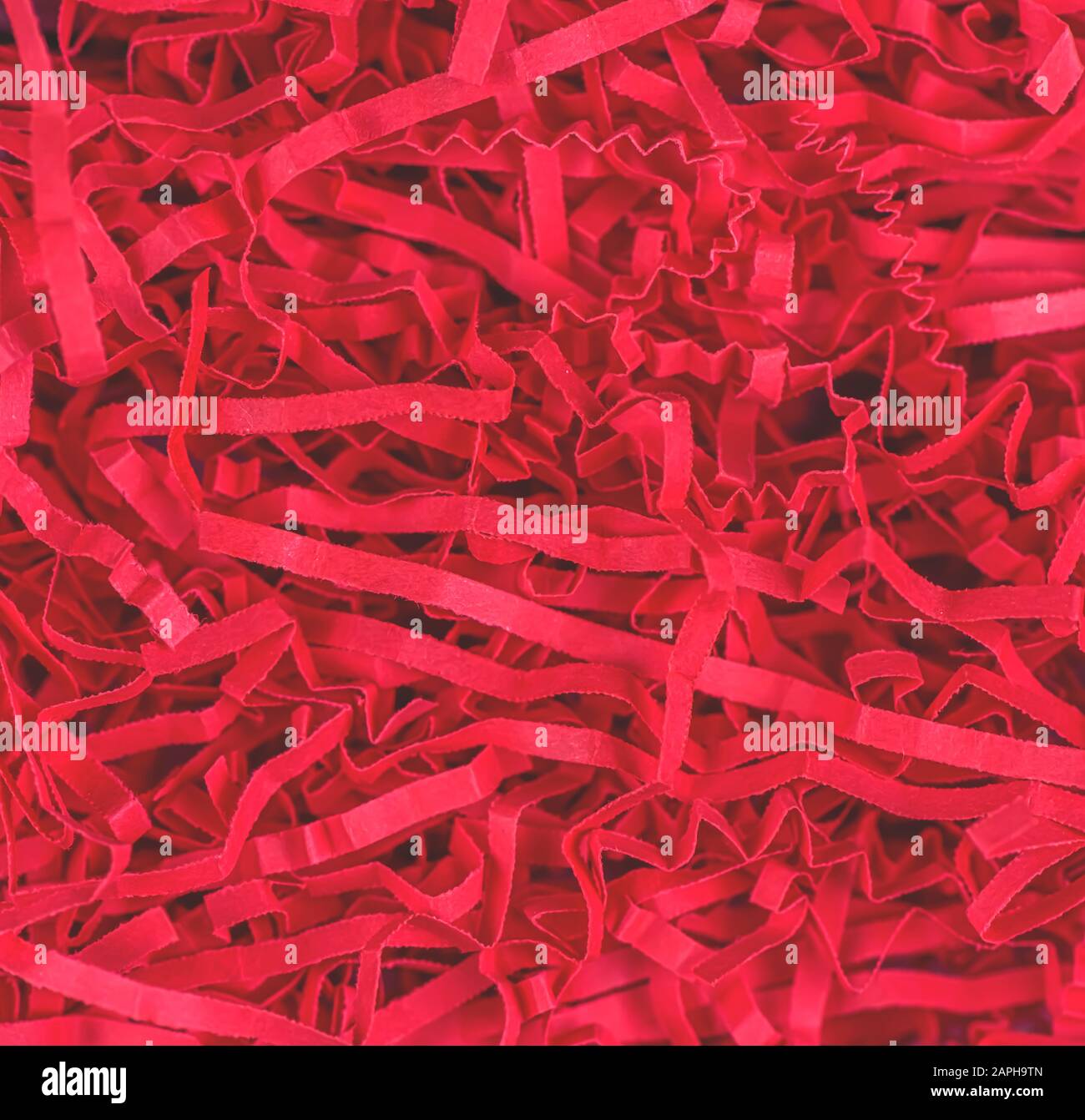 trama di sfondo. carta rossa di riempimento per il regalo, scatola. Quadrato Foto Stock