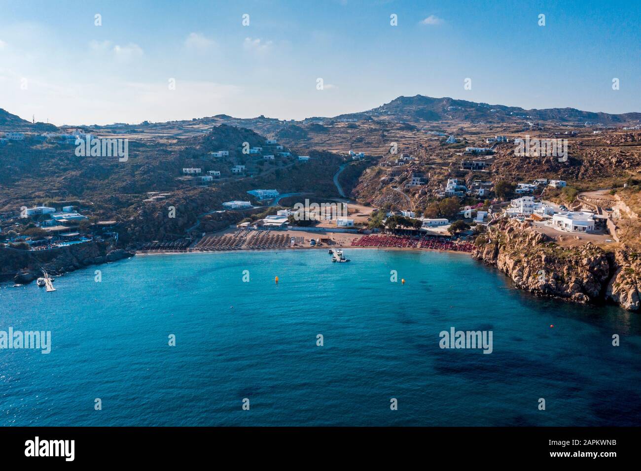 Grecia, Mykonos, Mykonos città e mulini a vento al tramonto Foto Stock