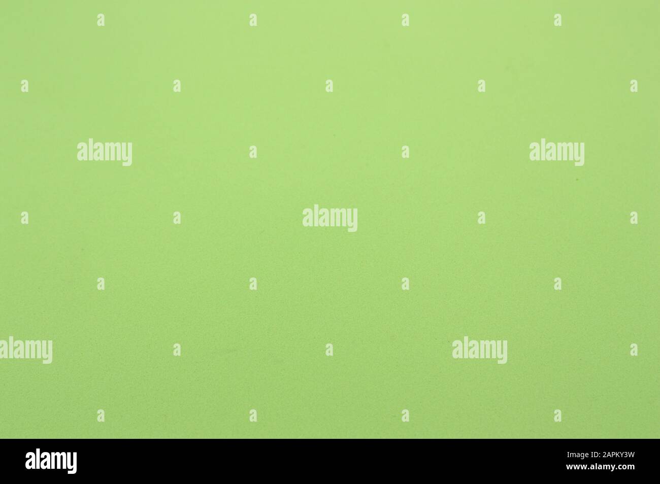 Sfondo di una texture verde chiaro dove è possibile aggiungere qualsiasi tipo di testo o grafica. Spazio di copia Foto Stock