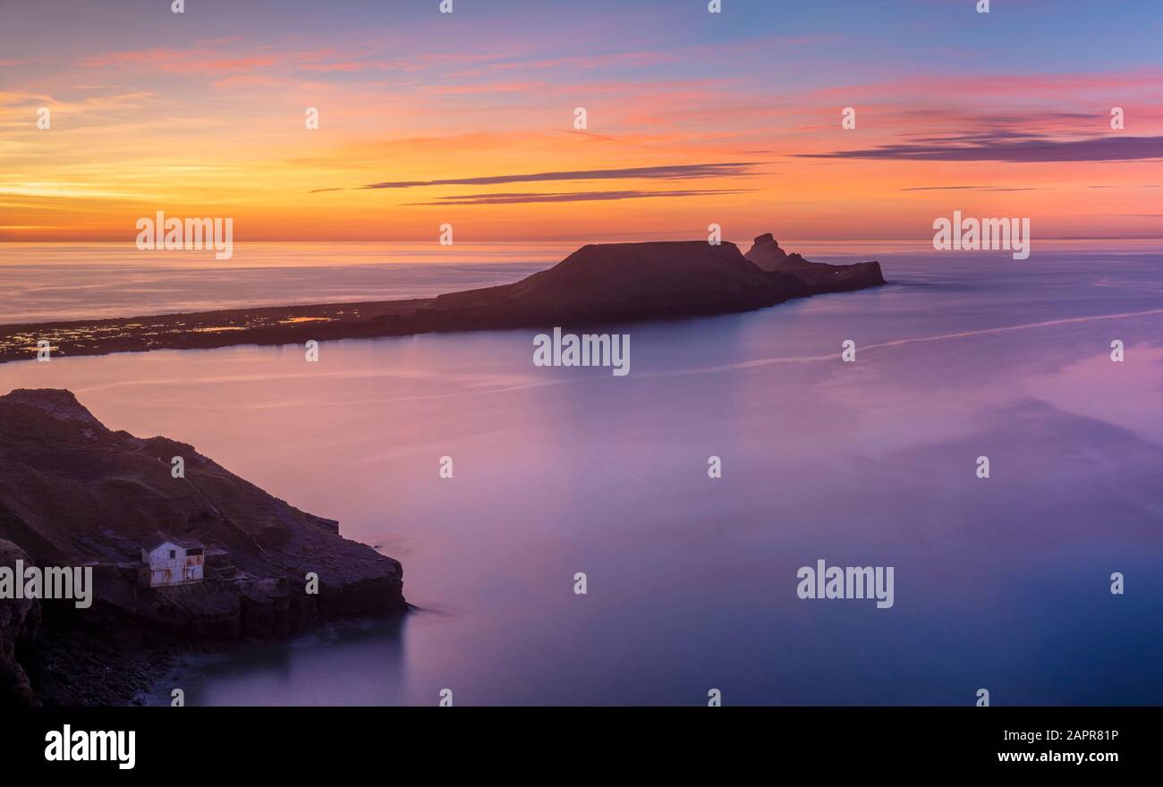 Testa di verme Rhossili Bay al tramonto sulla penisola di Gower un AONB West Glamorgan South Wales UK GB Europe Foto Stock