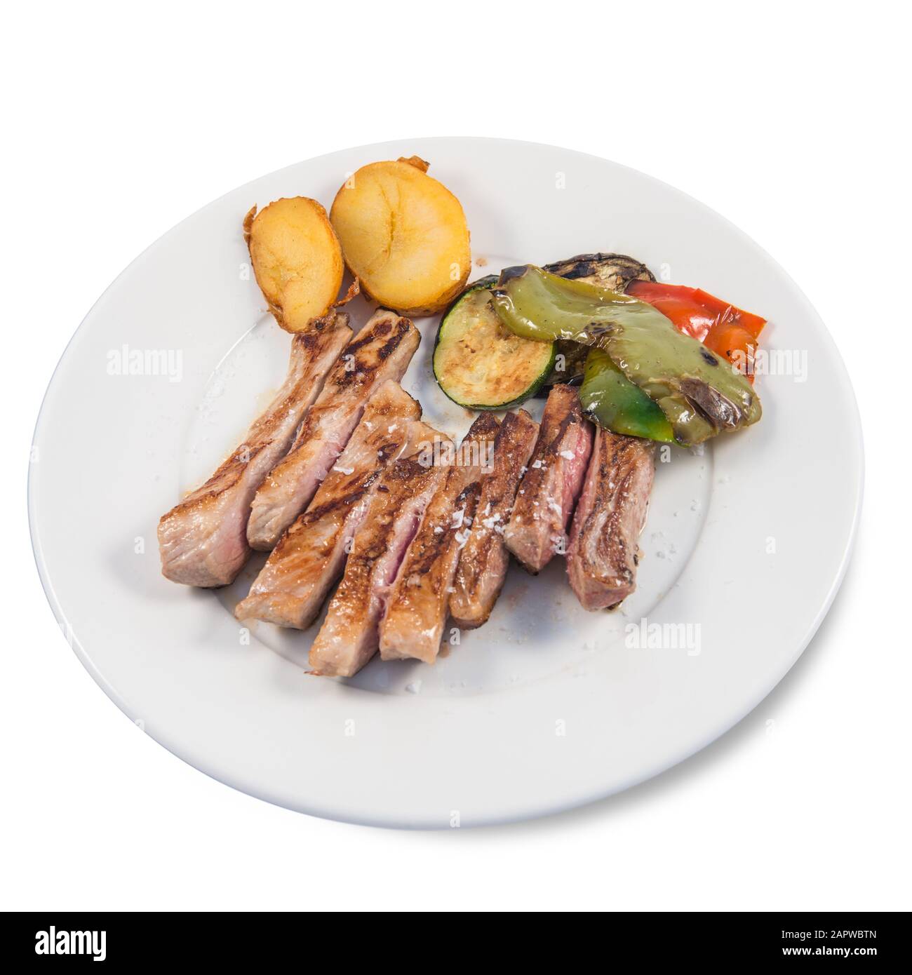 Un piatto di maiale Iberico secreto Foto stock - Alamy