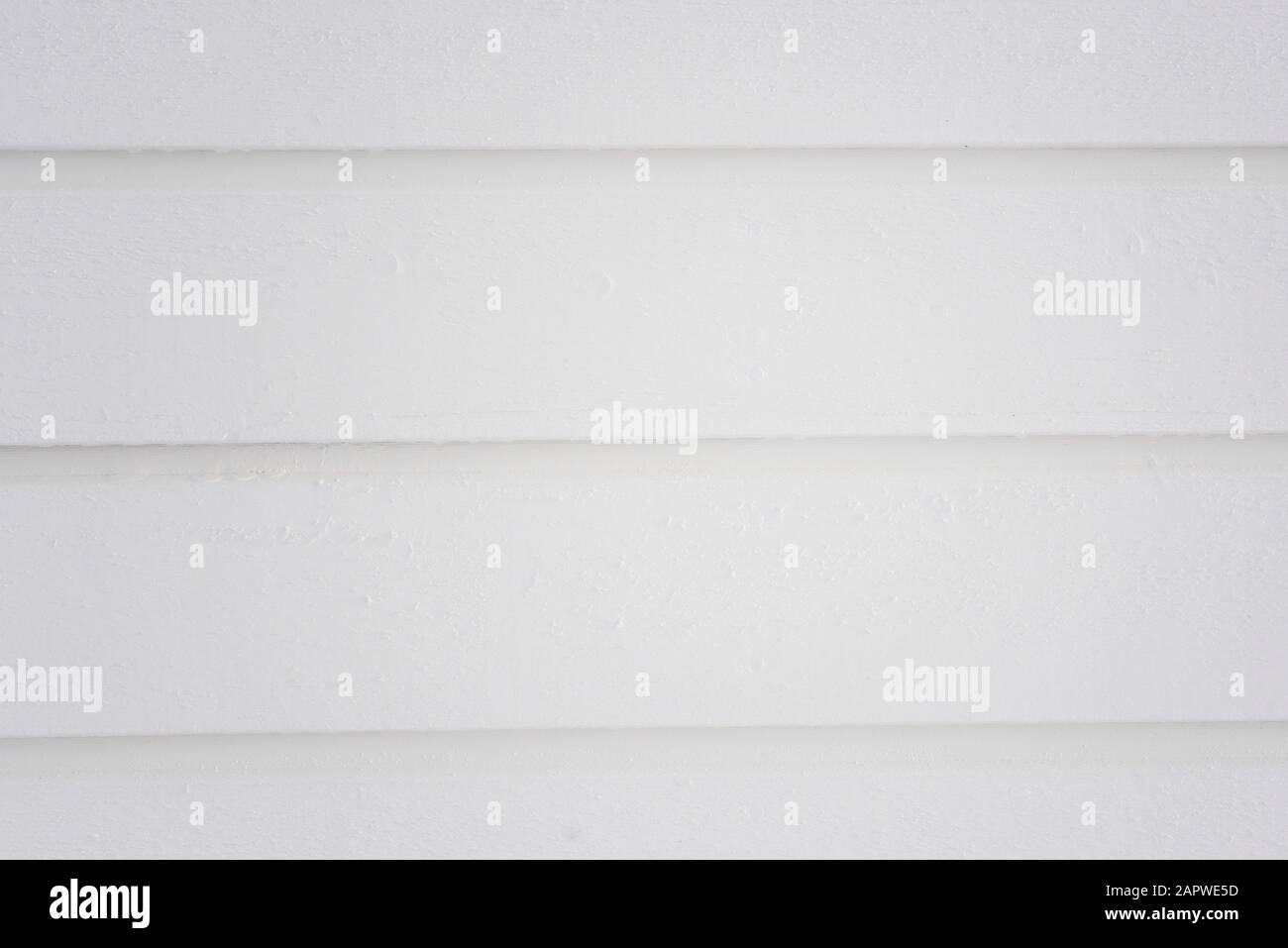 primo piano di un muro di legno dipinto di bianco Foto Stock