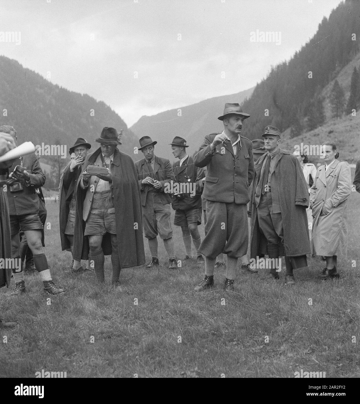 Uomini, donne, montagne, visitatori Data: Parole Chiave dense: Montagne, visitatori, uomini, donne Foto Stock