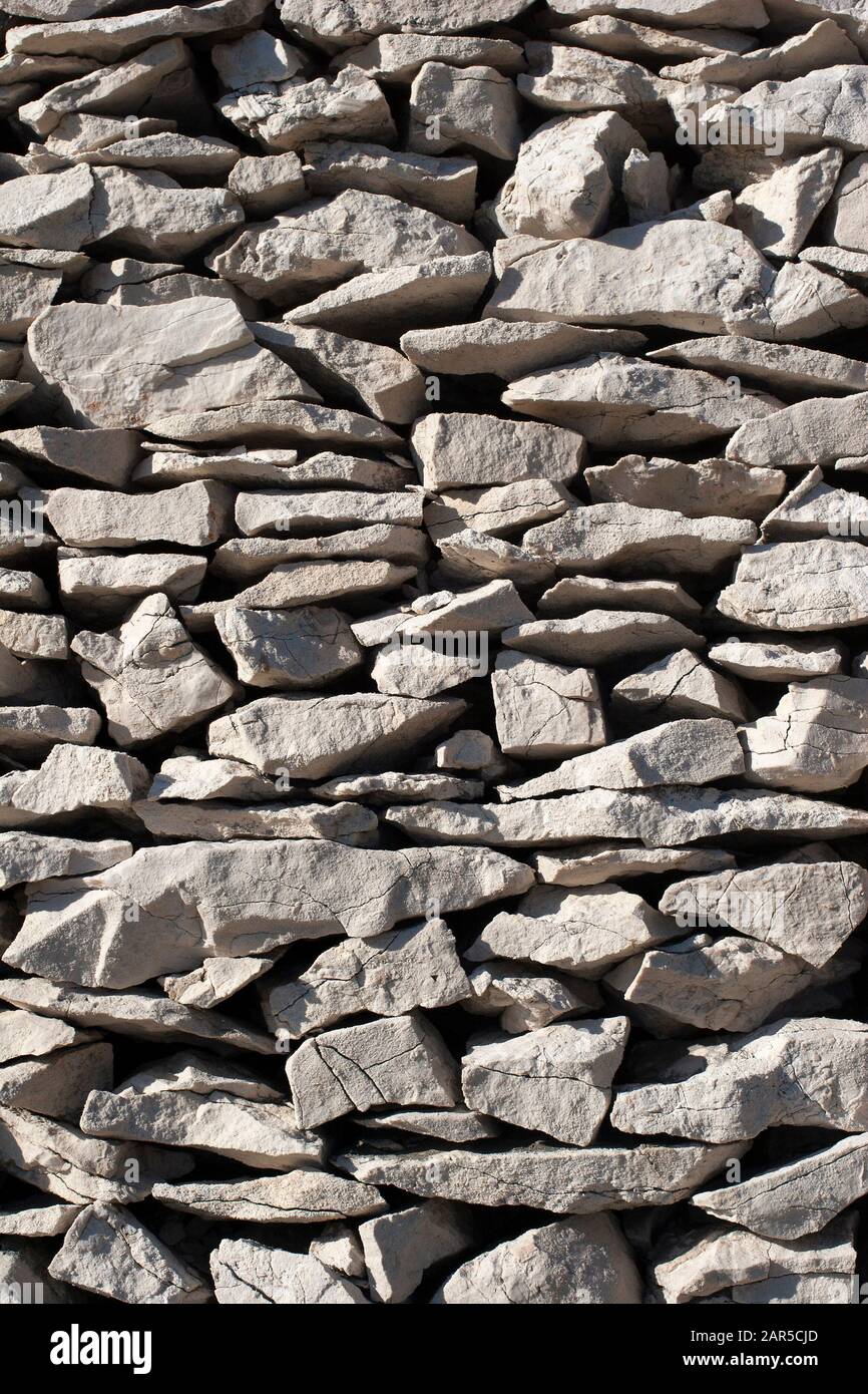 Costruzione tradizionale di pareti in pietra senza materiale legante Foto Stock