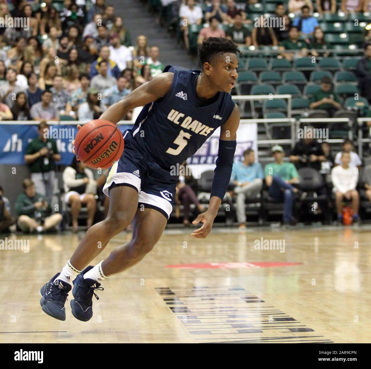 25 gennaio 2020 - UC Davis Aggies guardia Ezra Manjon (5) durante una partita tra le Hawaii Rainbow Warriors e UC Davis Aggies presso lo Stan Sheriff Center di Honolulu, HI - Michael Sullivan/CSM Foto Stock