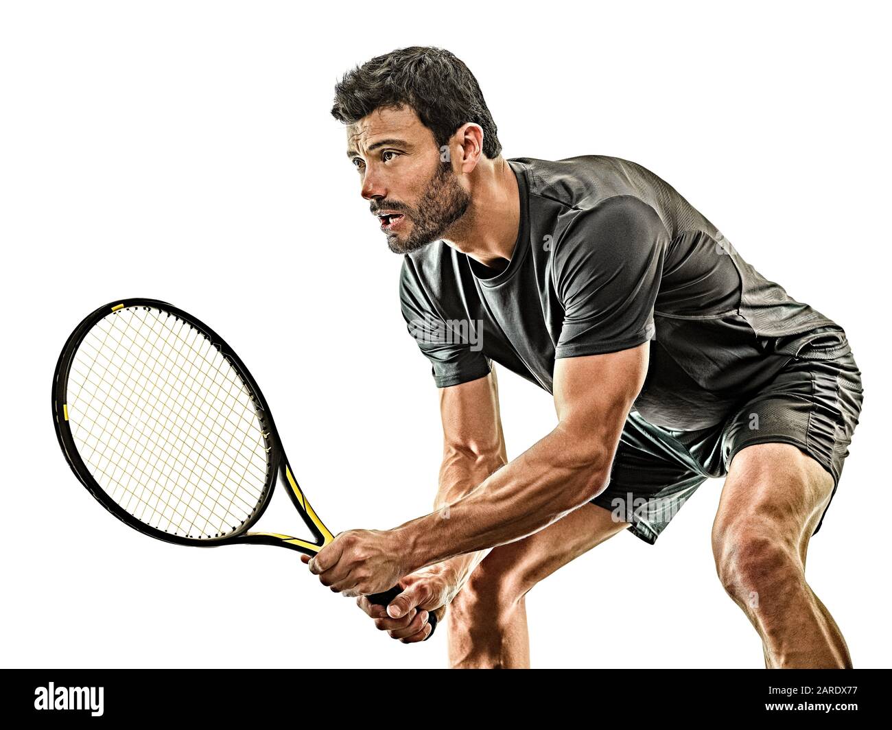 un uomo caucasico maturo giocatore di tennis in studio isolato su sfondo bianco Foto Stock