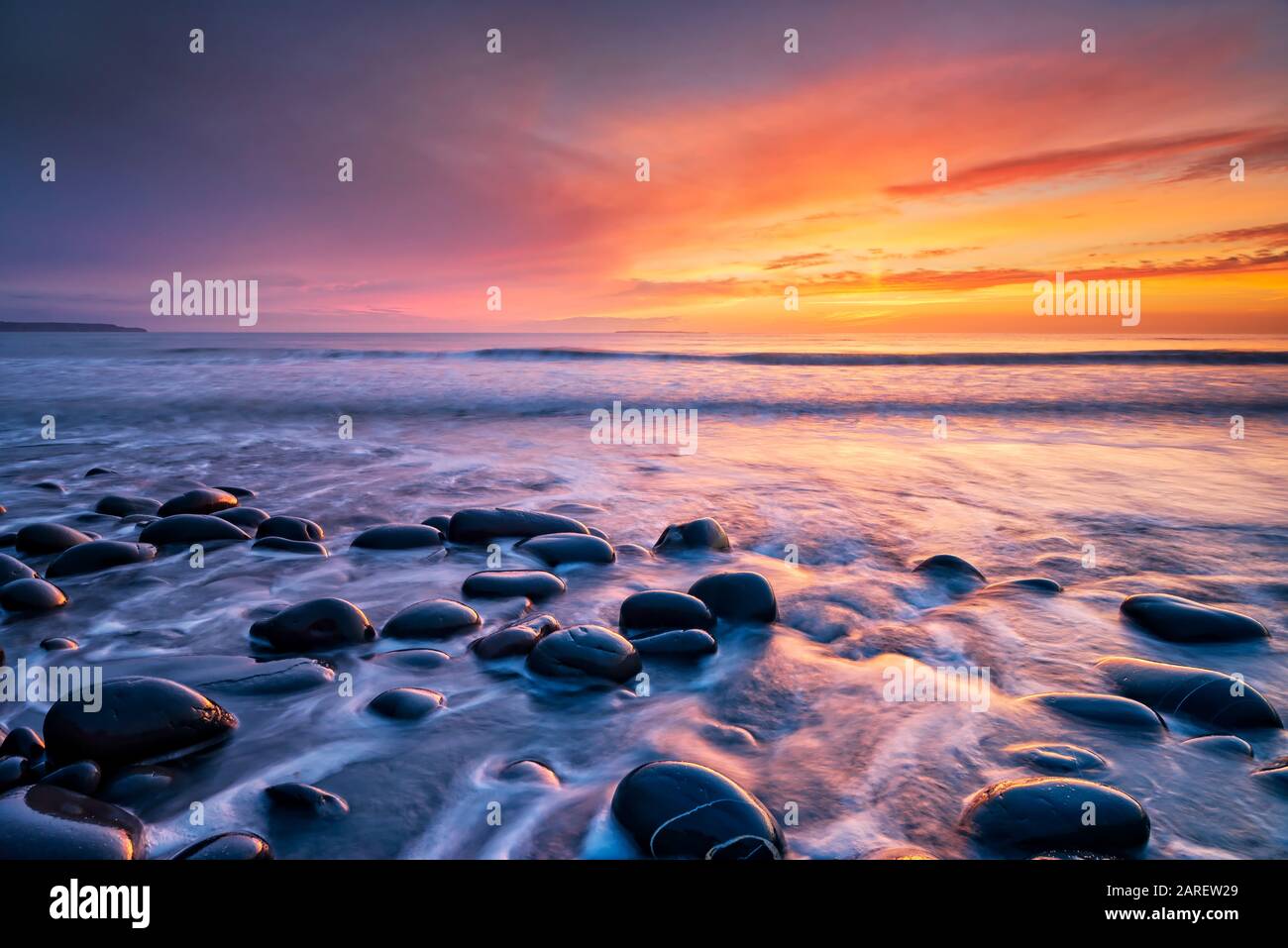 Tramonto A Westward Ho! Devon del Nord, Regno Unito Foto Stock