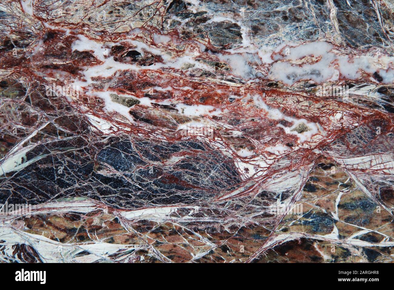 Struttura in marmo scuro naturale, dettagliata struttura in pietra multicolore Foto Stock