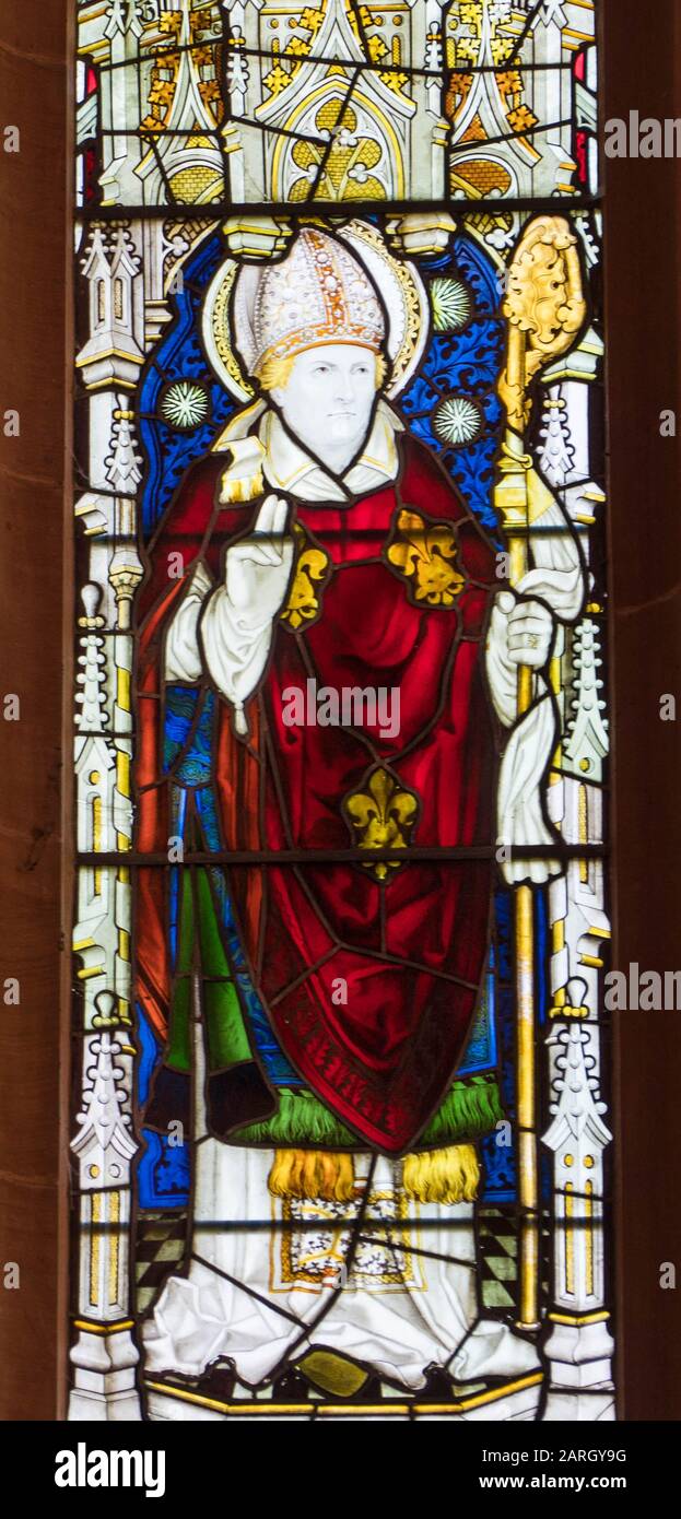 Vetrate di Charles Kempe raffiguranti Sant'Agostino. St Bartholomew Chiesa Di Molto Marcle, Herefordshire Regno Unito. Febbraio 2019 Foto Stock