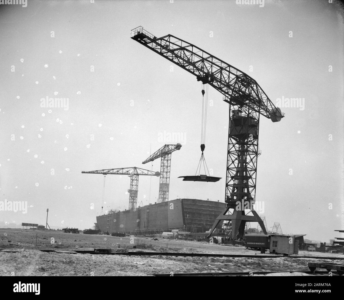 Gru di messa in servizio con la massima capacità di sollevamento Data: 31 marzo 1958 Parole Chiave: Messa in funzione Foto Stock