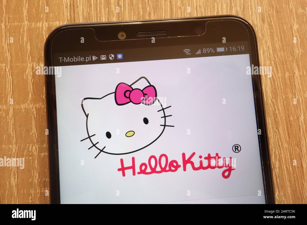 Logo Hello Kitty visualizzato su uno smartphone moderno Foto Stock