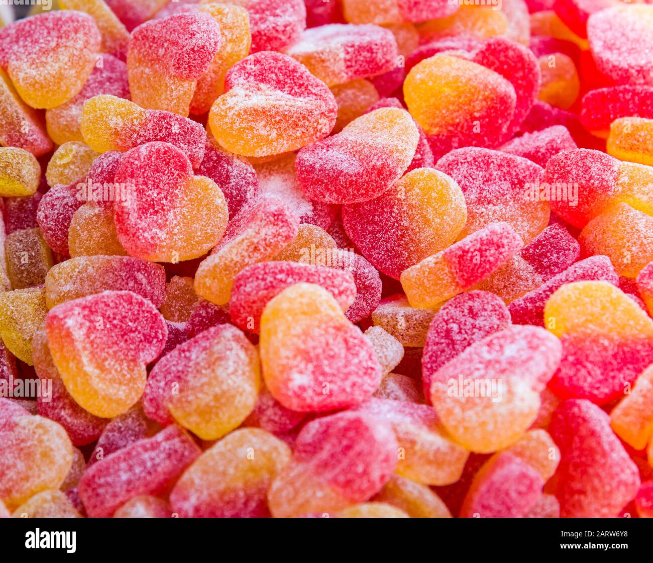 Zuccherini colorati candy forma di cuore di colore di sfondo jelly  caramelle Foto stock - Alamy