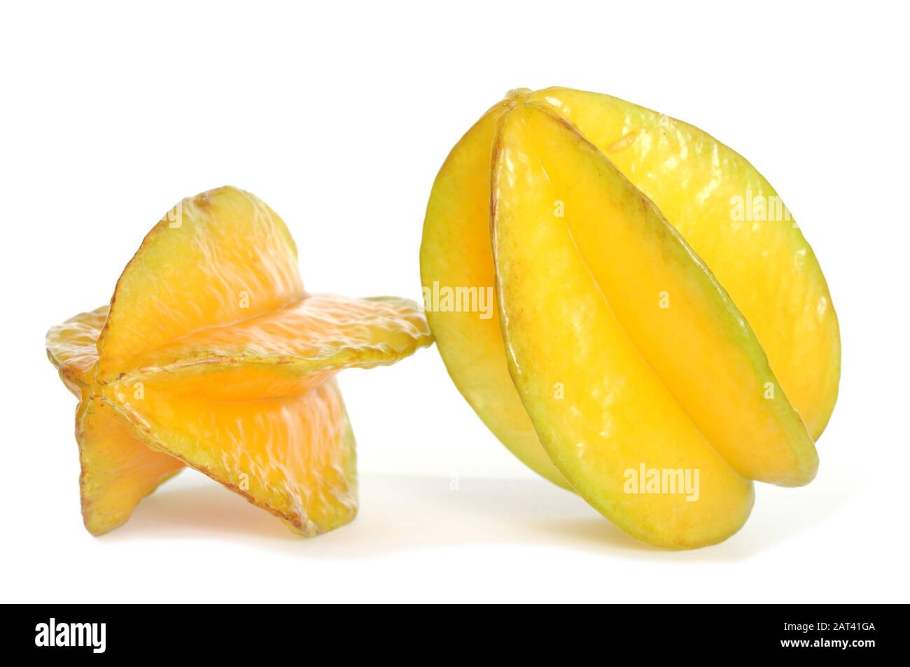 Due stelle mature frutta su sfondo bianco Foto Stock