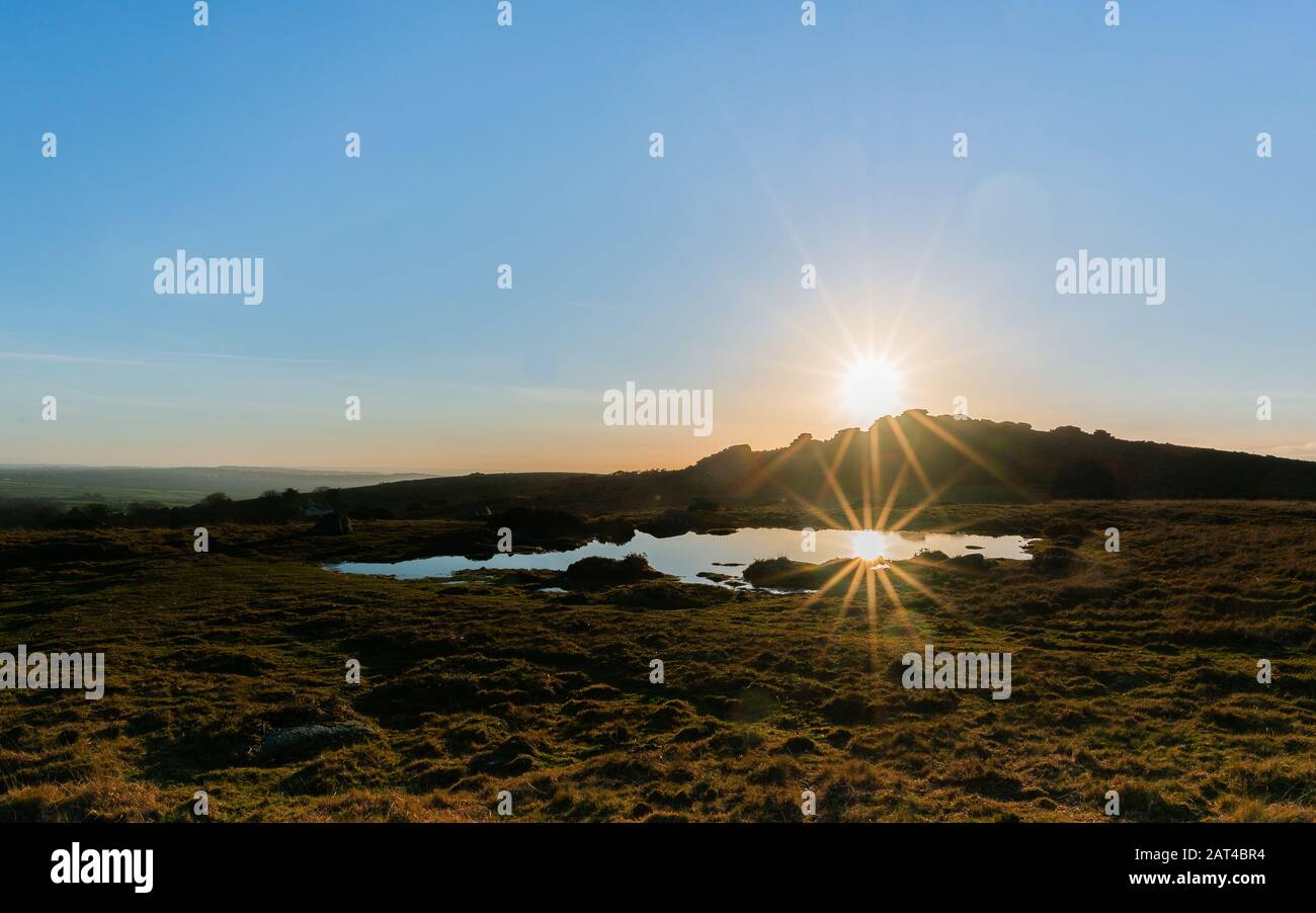 Laghetto di brughiera al tramonto Foto Stock