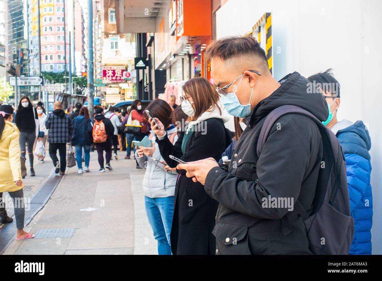 Hong Kong - Gennaio 30th, 2020: Persone che indossano maschere chirurgiche nel timore di Wuhan Coronavirus. Foto Stock