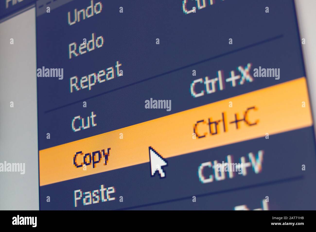 Voce di menu software con comando di copia evidenziato e cursore del mouse selezionato, macro shot Foto Stock