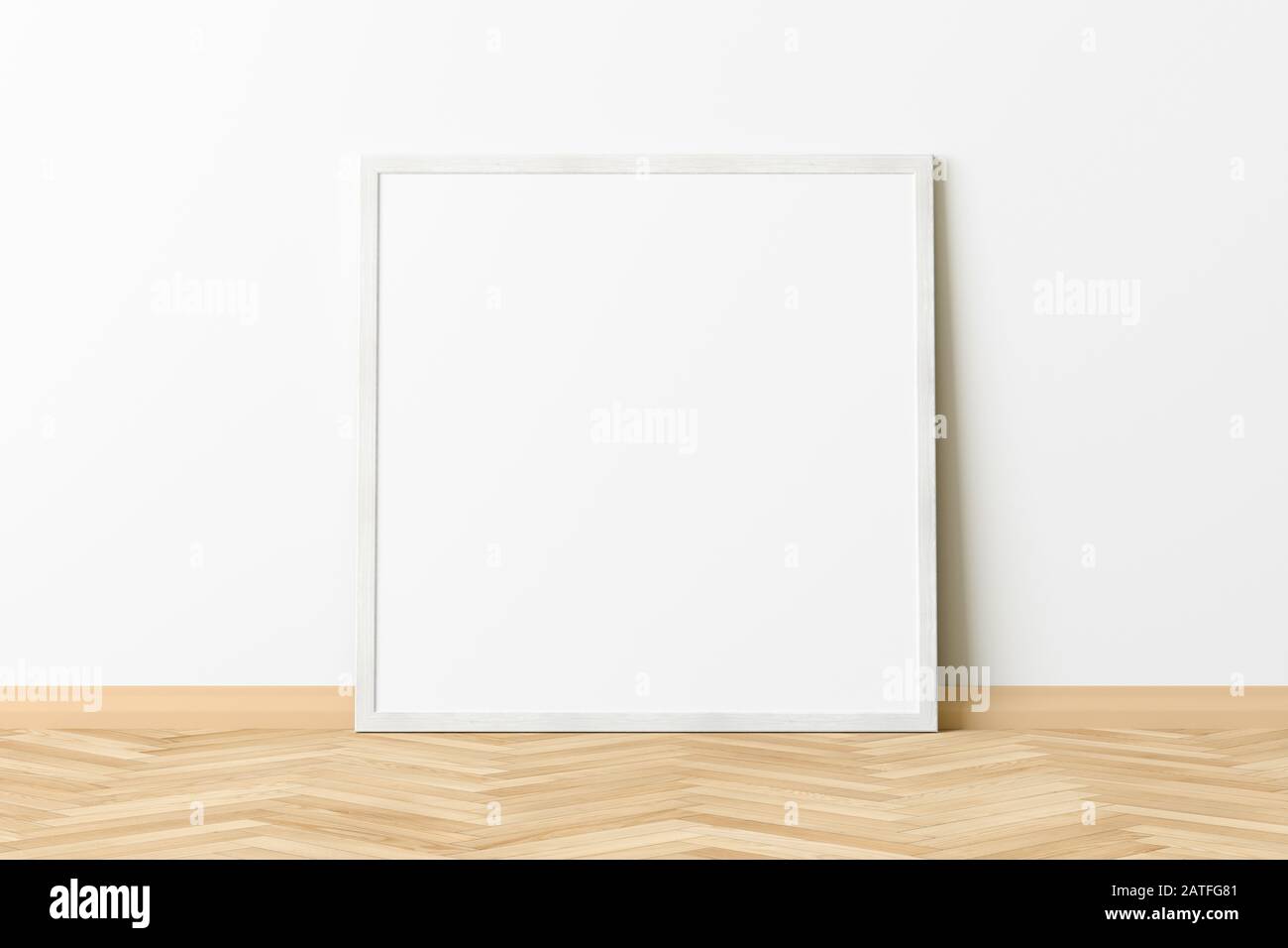 Cornice quadrata vuota per poster su pavimento in parquet a spina di pesce, accanto a una parete bianca. Tracciato di ritaglio intorno al poster Foto Stock