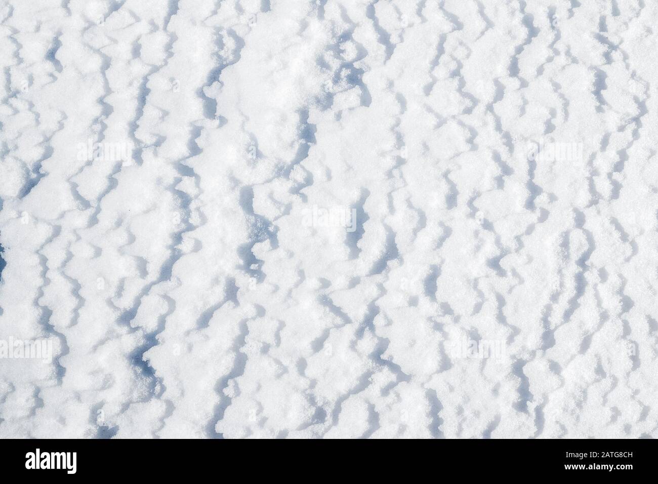 Tessuto di neve IISnow modello in forma di zigzag e linee ondulate. Foto Stock