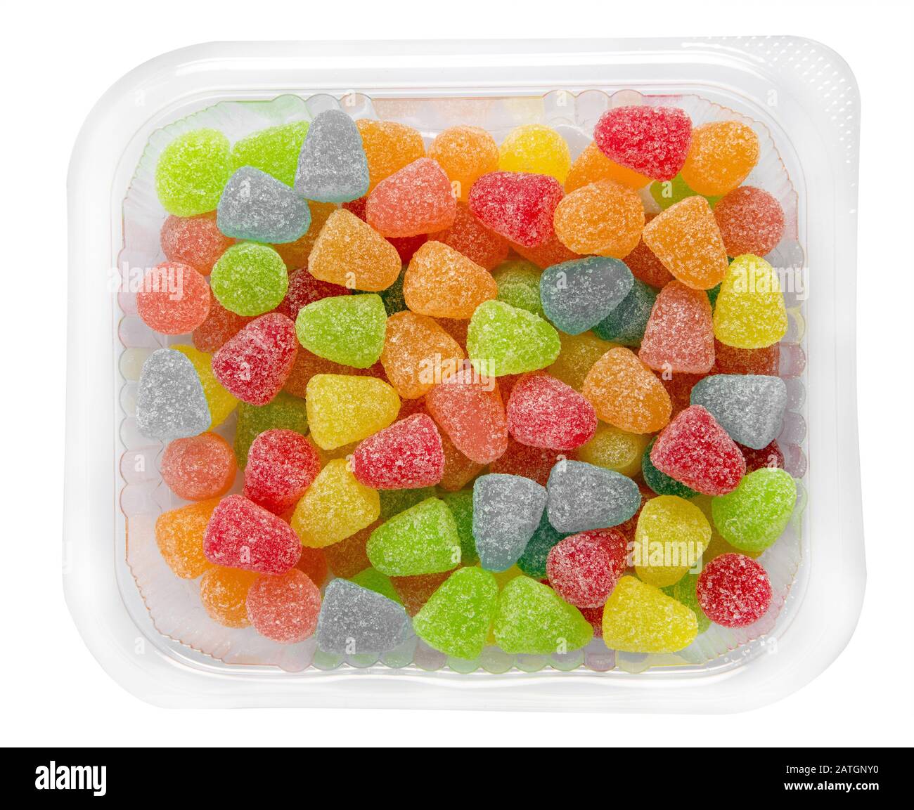 Confezione in plastica trasparente di confetti colorati di gelatina sul bianco visto da vicino dall'alto Foto Stock