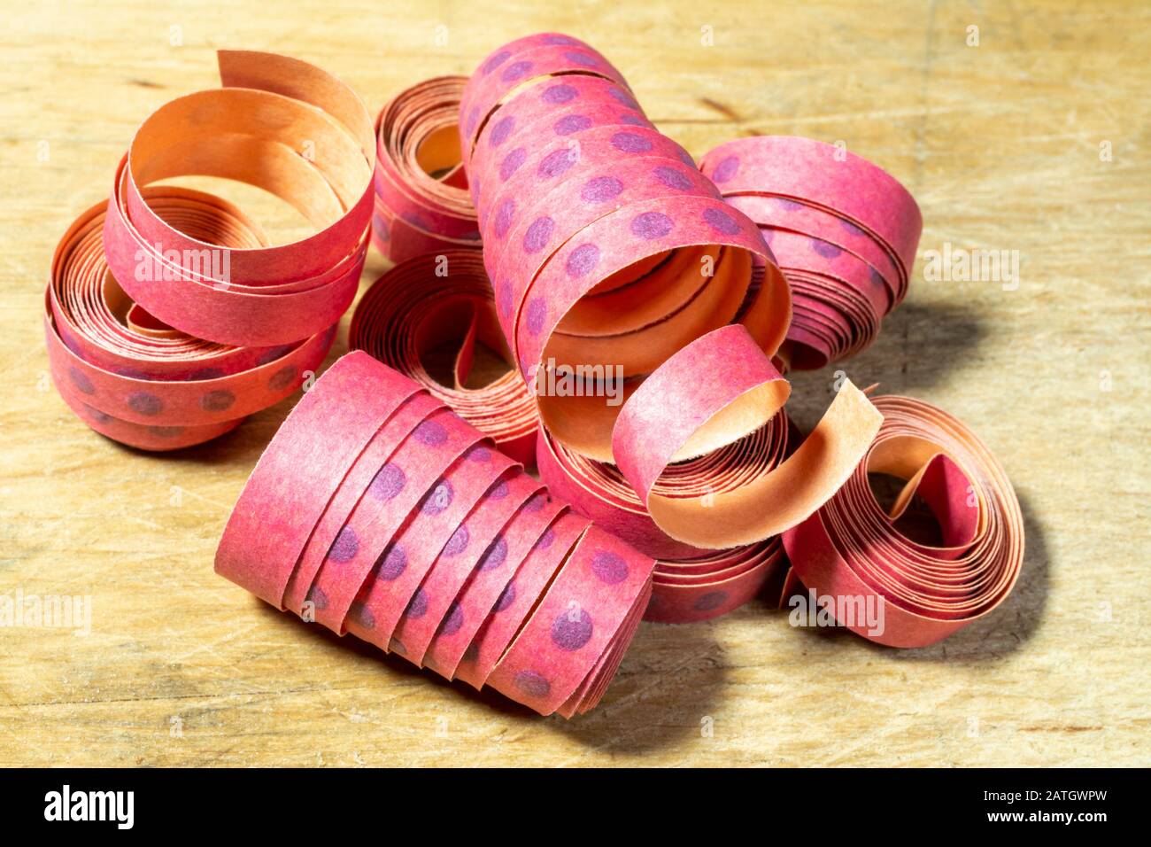 Rotoli di carta vintage per pistole giocattolo Foto Stock