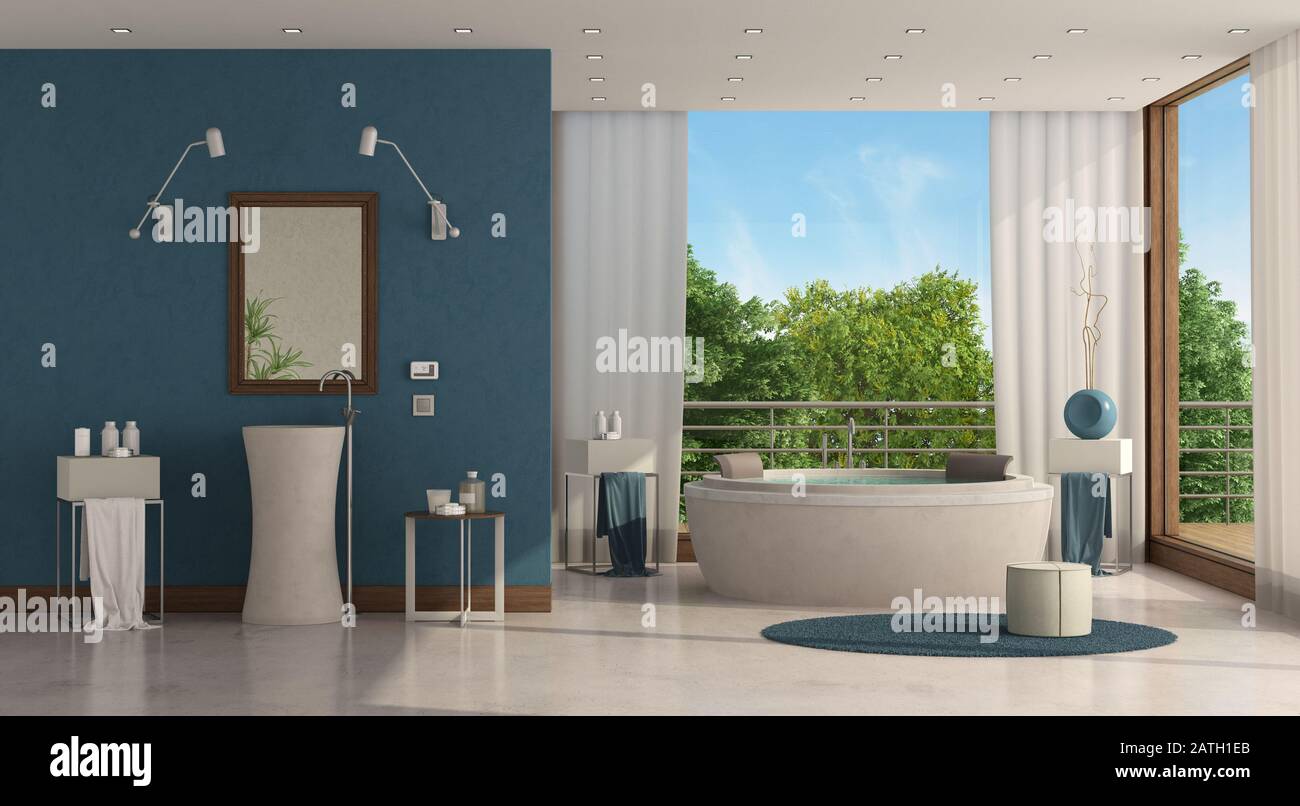 Bagno di lusso di una villa moderna con vasca rotonda e lavabo - 3d rendering Foto Stock