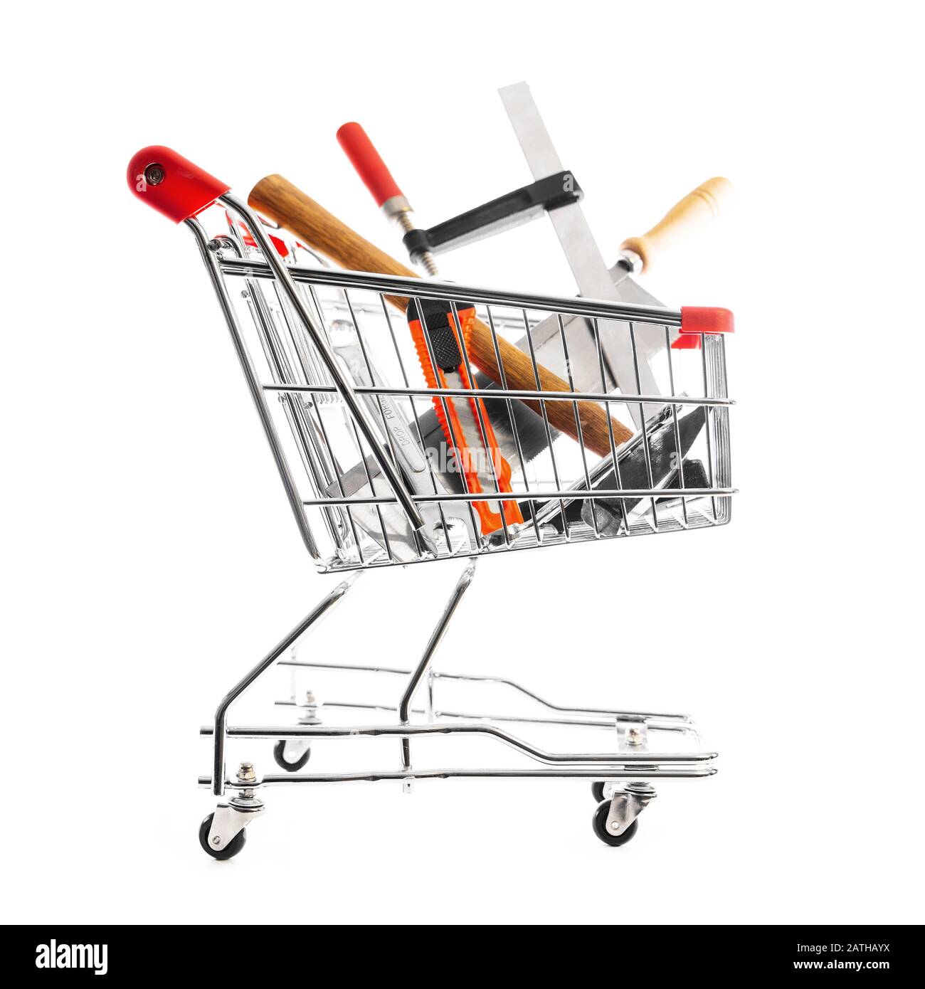 carrello o carrello shopping pieno di vari strumenti, concept online shopping o centro commerciale Foto Stock