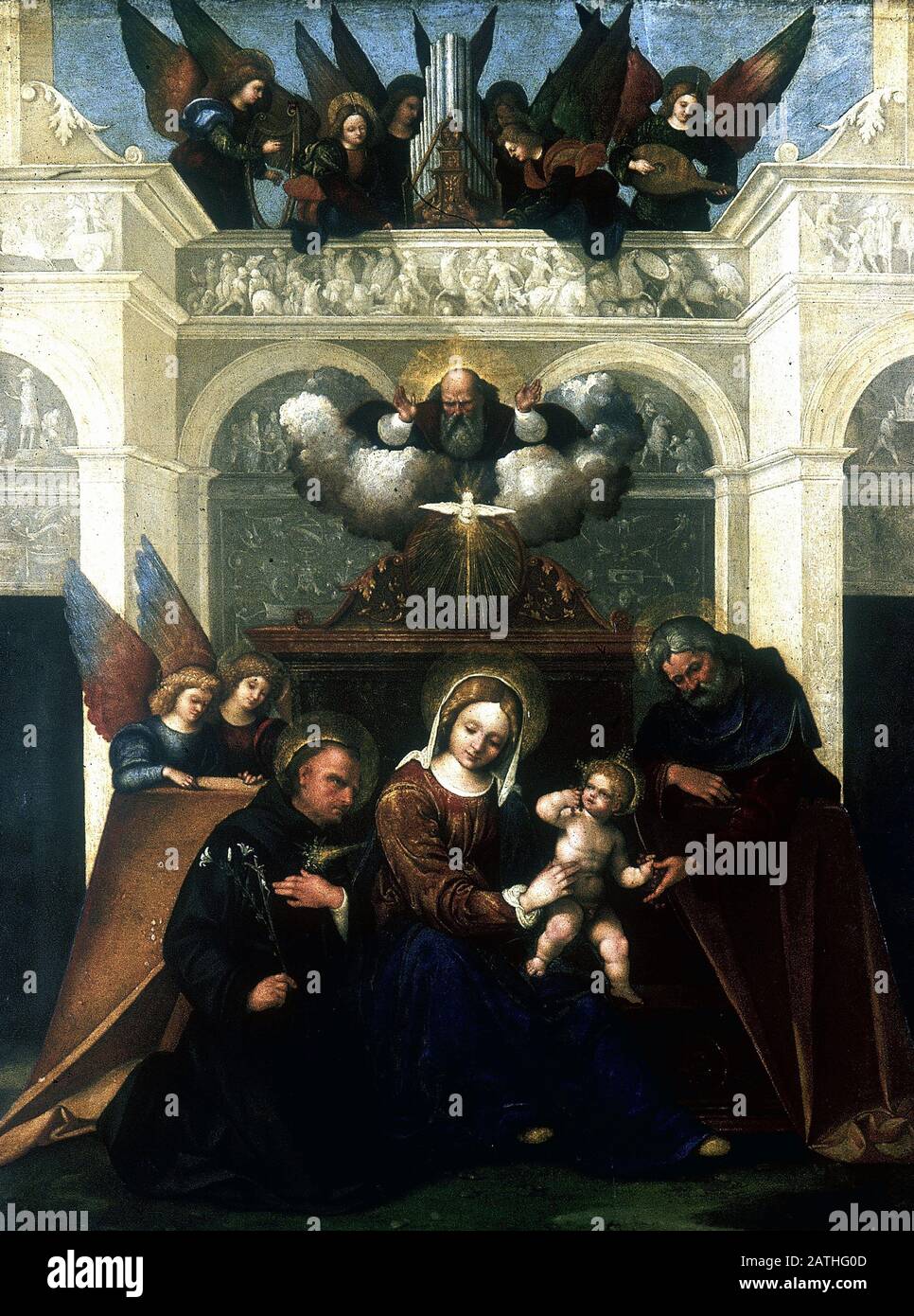 Ludovico Mazzolino Scuola Italiana la Sacra Famiglia con San Nicola di Tolentino, la Trinità e gli Angeli Circa 1520 olio su legno (80,6 x 62,2 cm) Londra, Galleria Nazionale Foto Stock