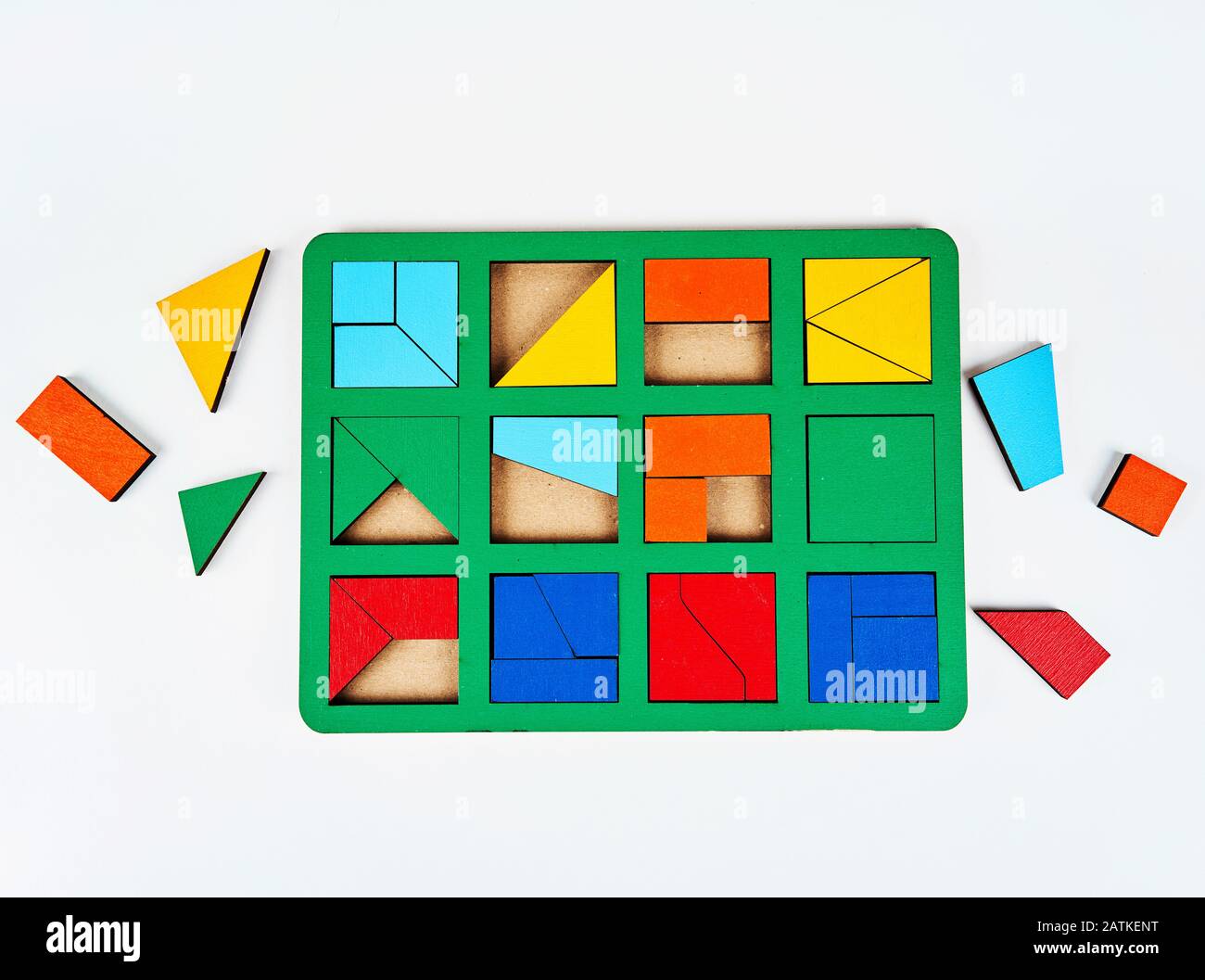 luminosi puzzle per bambini su uno sfondo bianco Foto Stock
